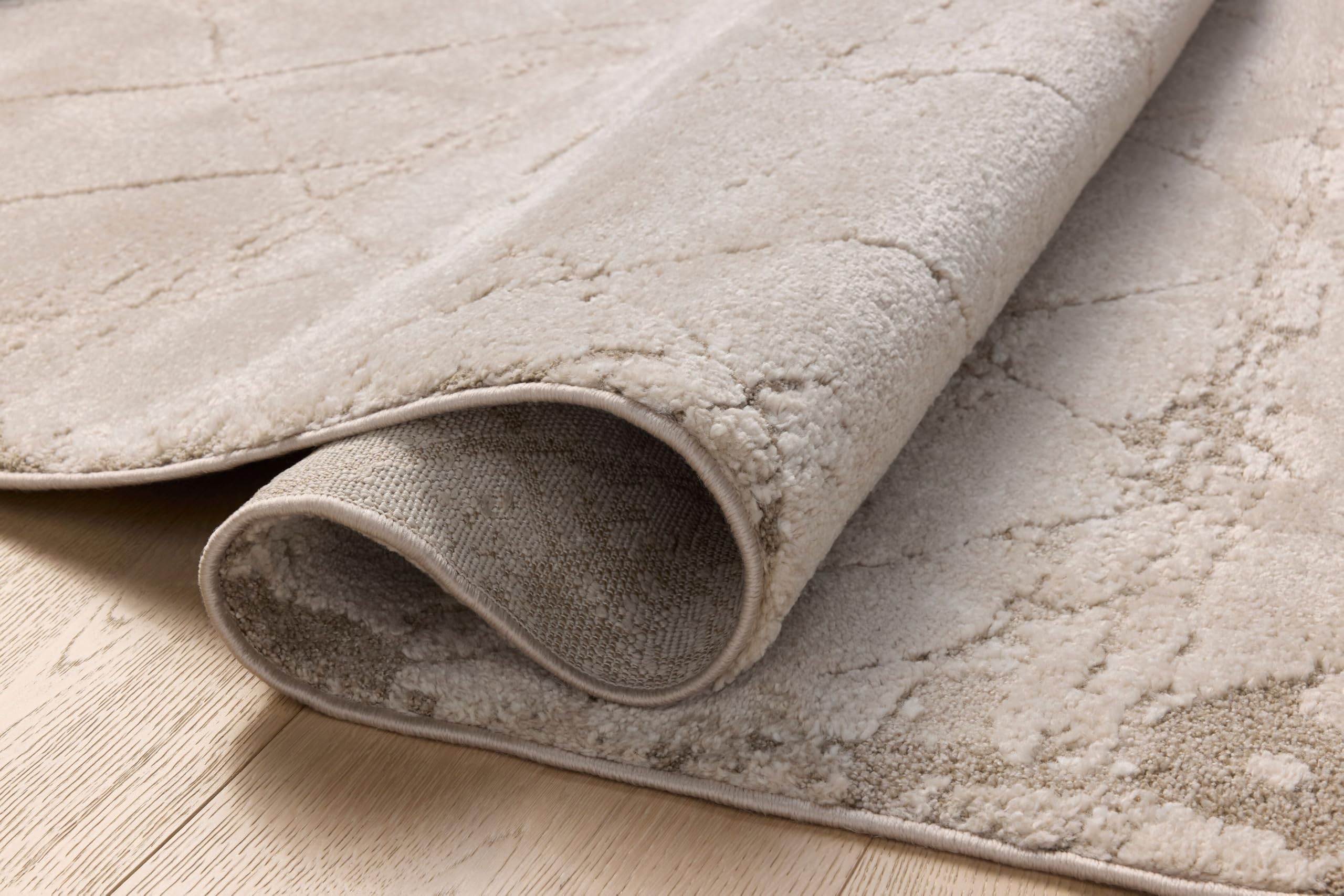 Ivory Abstract Area Rug Collection
